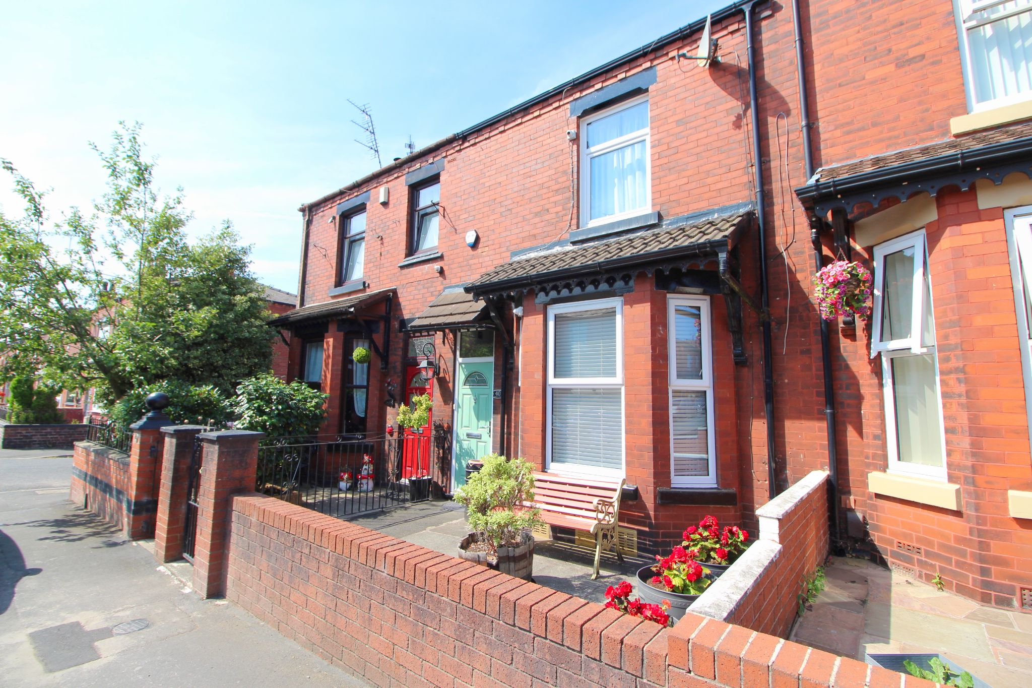 3 bedroom mid terraced house For Sale in Wigan - Photograph 1.