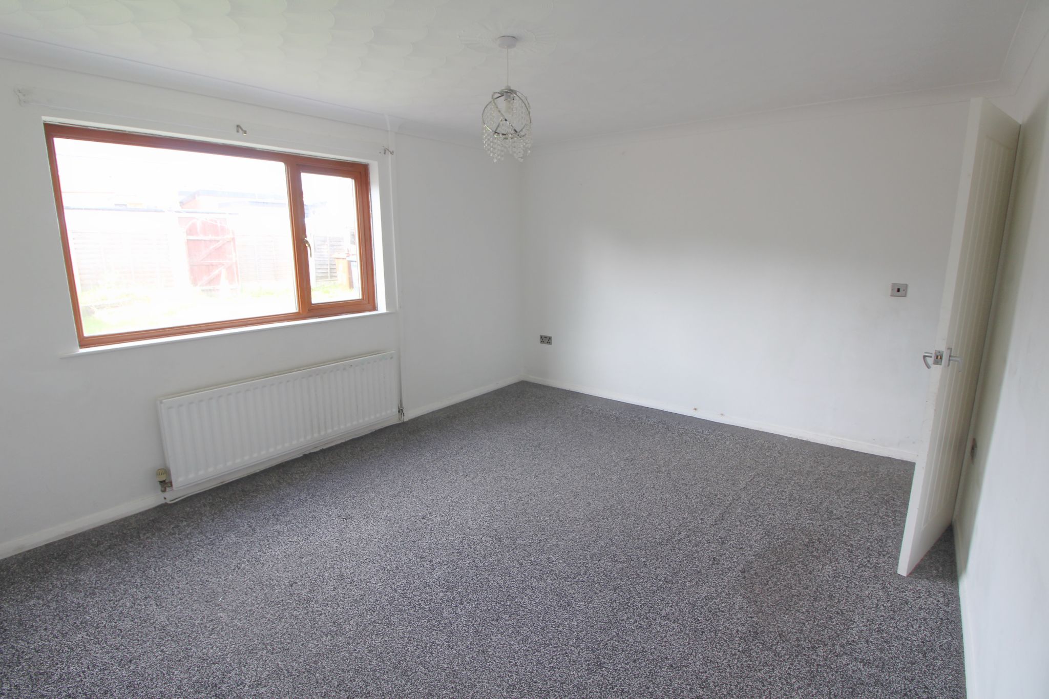 3 bedroom mid terraced house To Let in Wigan - Photograph 4.