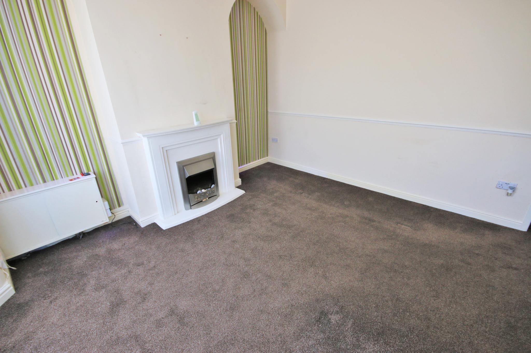 2 bedroom mid terraced house Let in Wigan - Photograph 3.