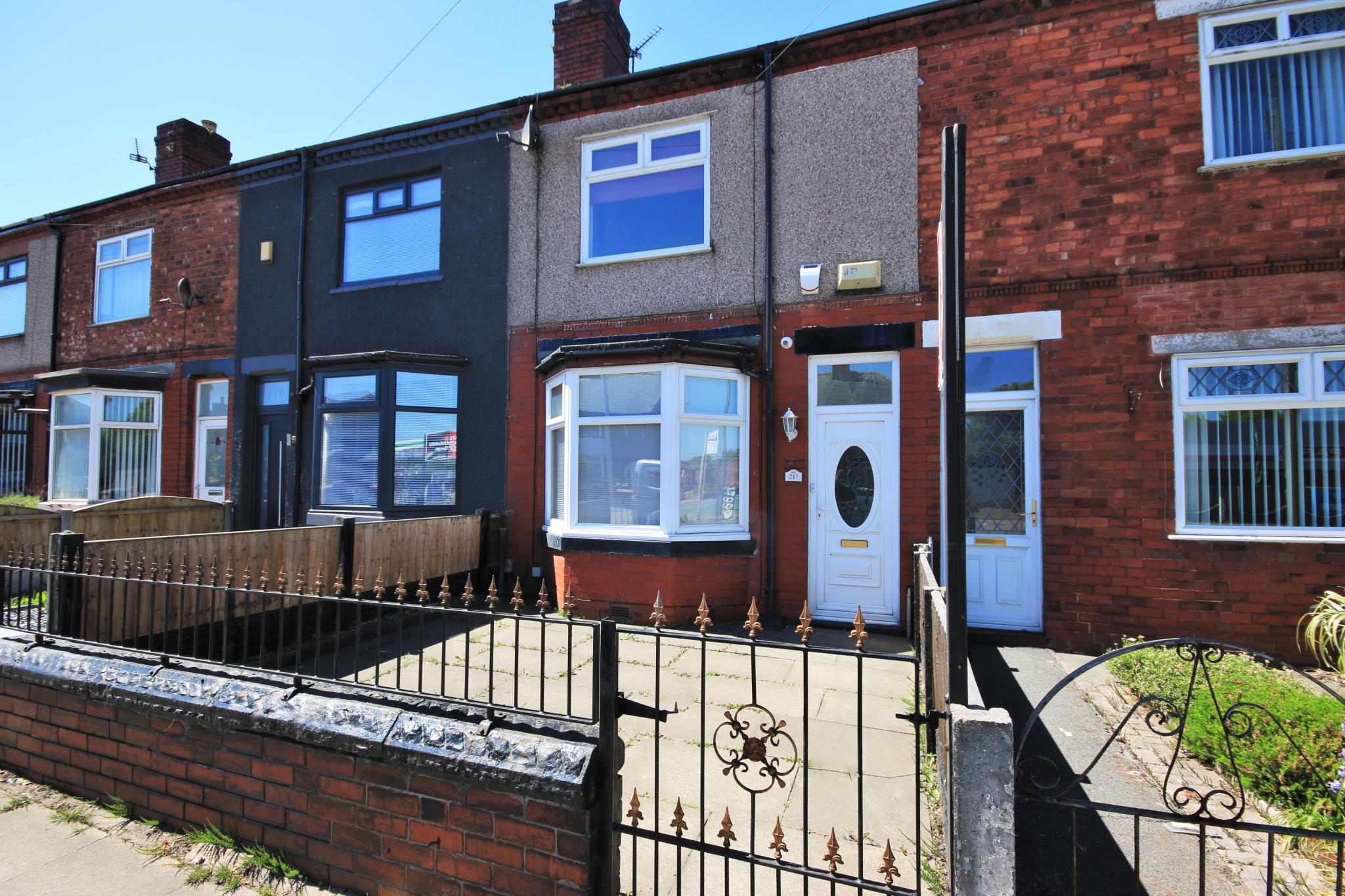 2 bedroom mid terraced house Let in Wigan - Photograph 1.