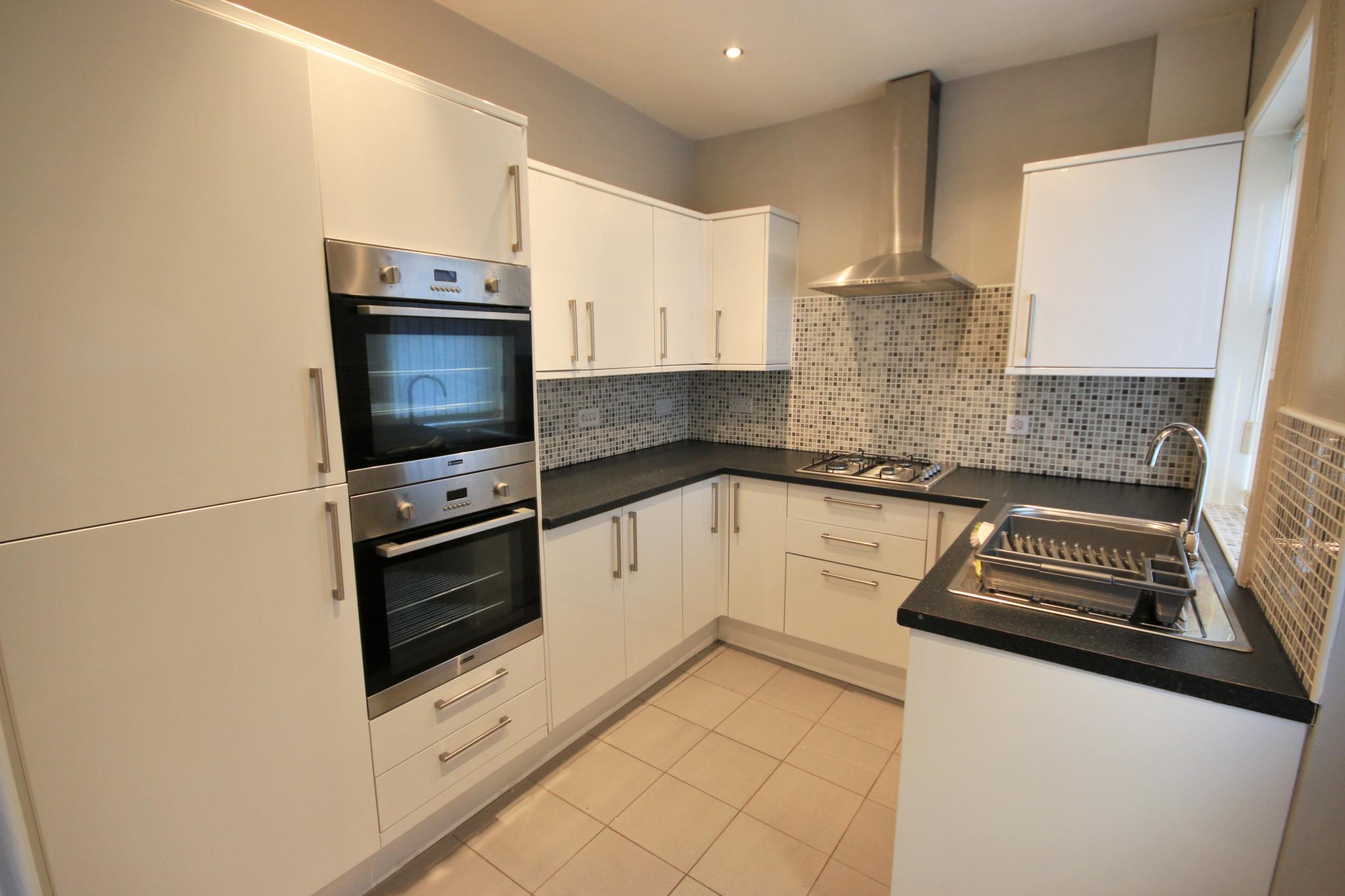 2 bedroom mid terraced house Let in Wigan - Photograph 4.