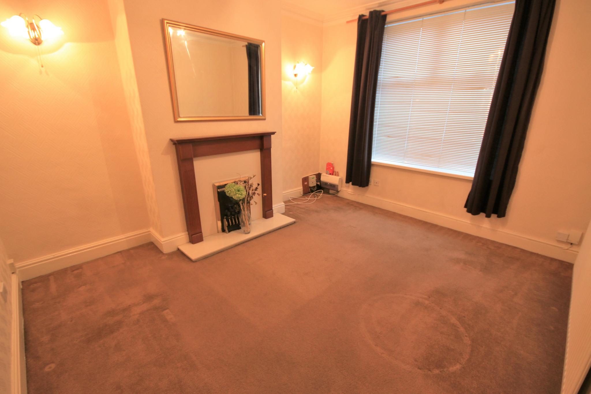 2 bedroom mid terraced house Let in Wigan - Photograph 2.