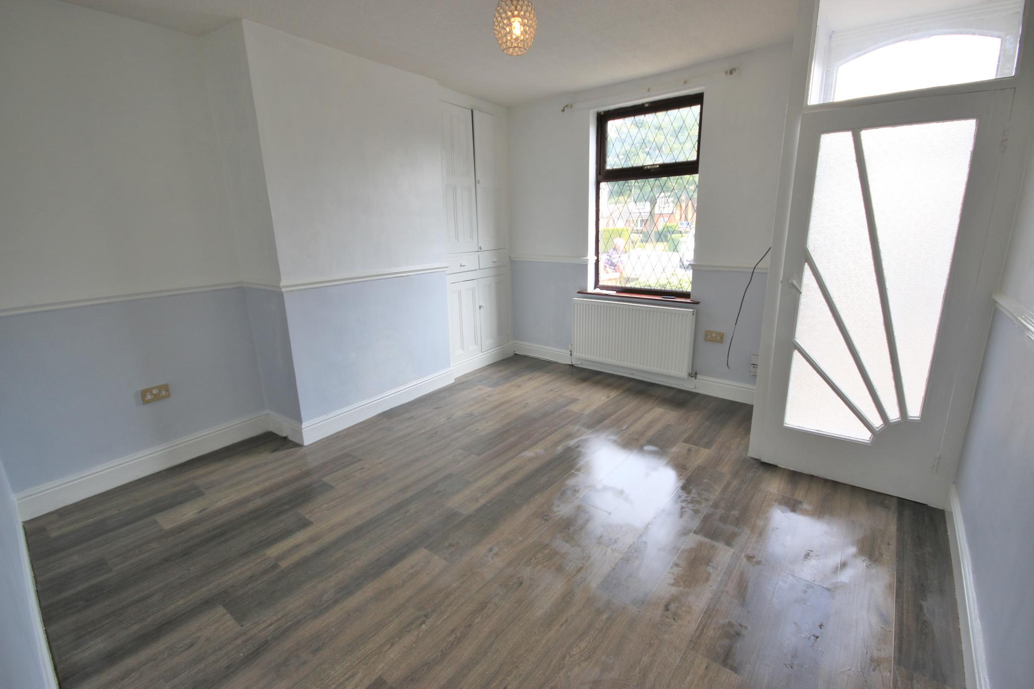 2 bedroom mid terraced house Let in Wigan - Photograph 2.