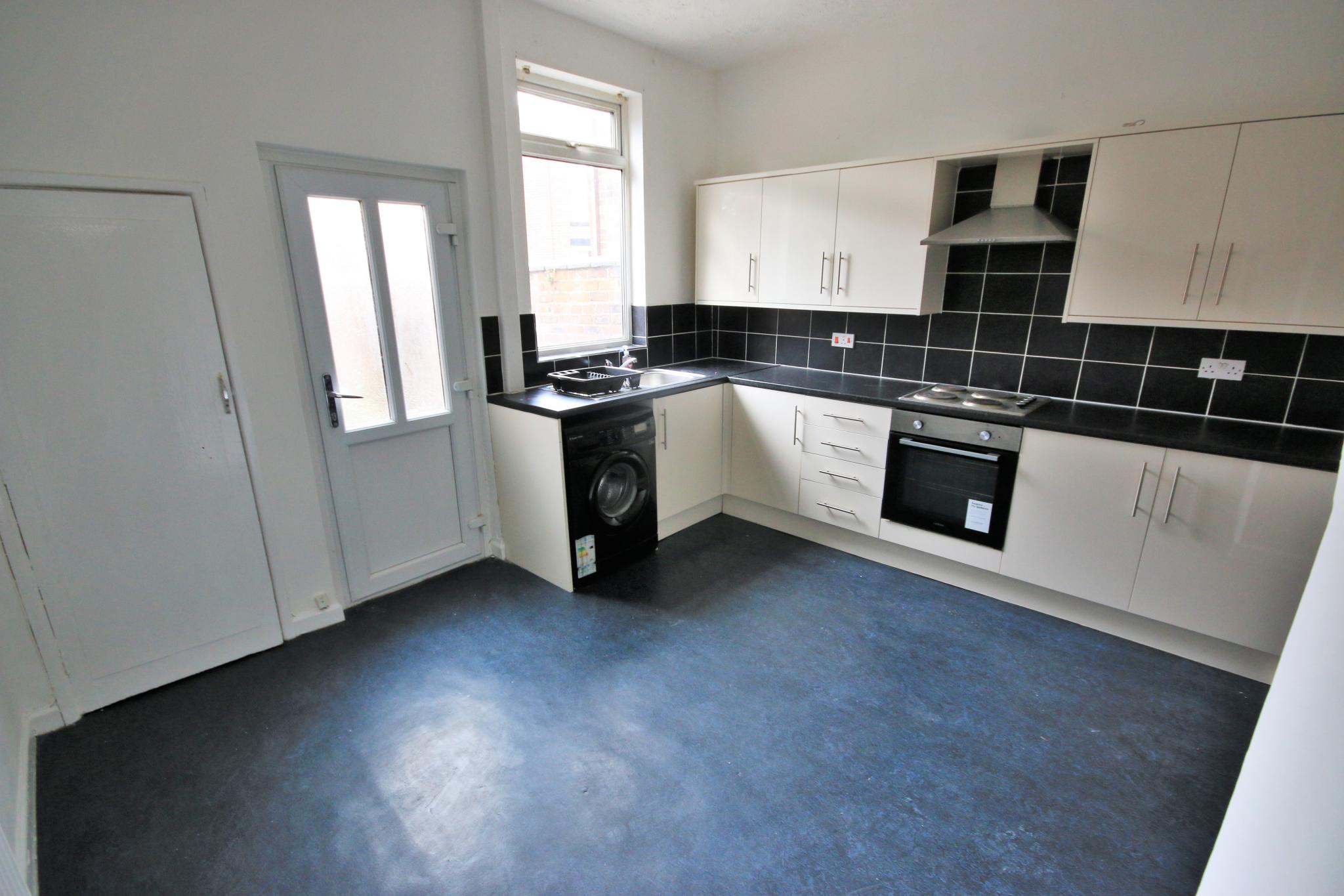 2 bedroom mid terraced house Let in Wigan - Photograph 3.
