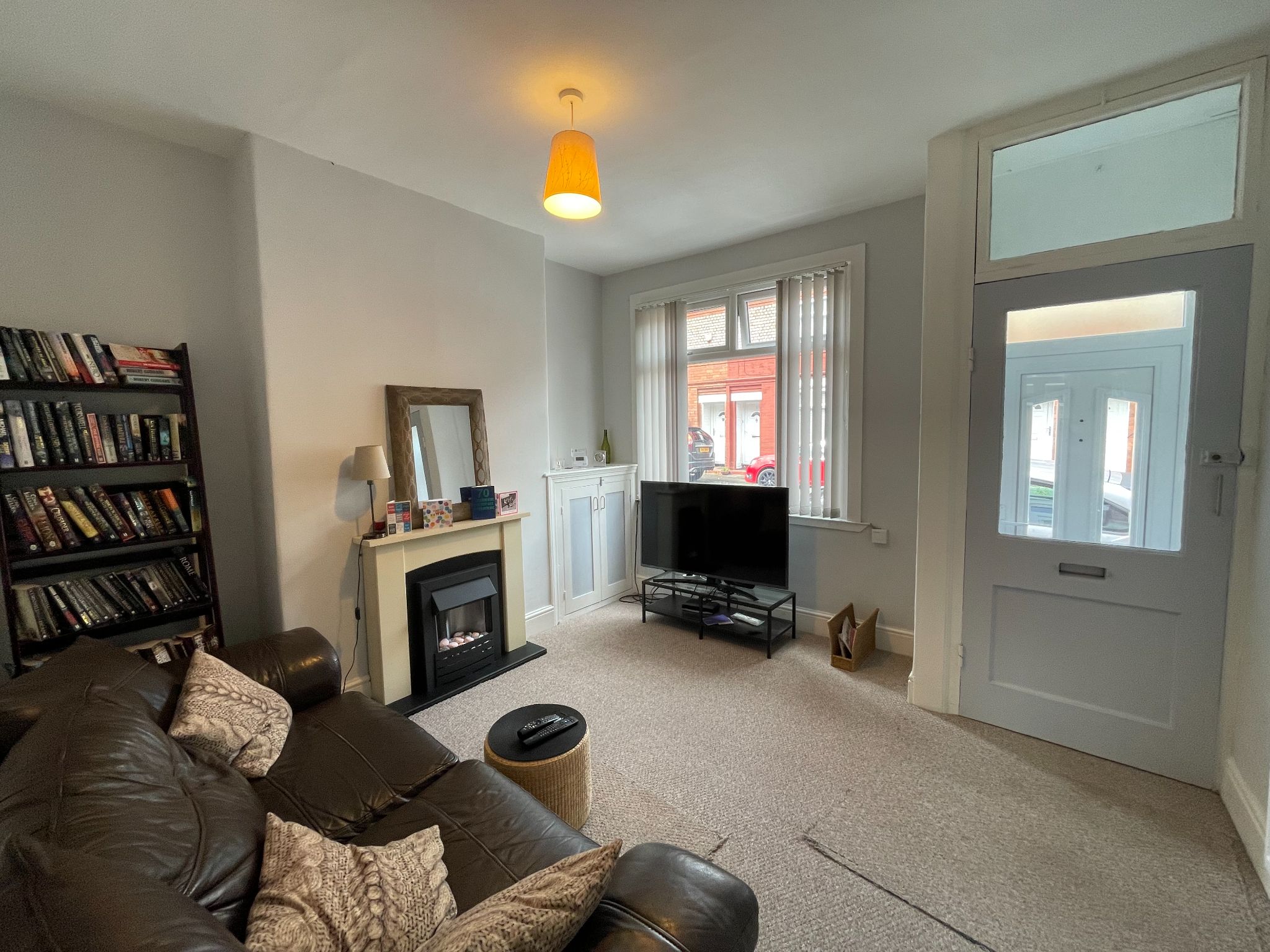 2 bedroom mid terraced house SSTC in Manchester - Photograph 3.