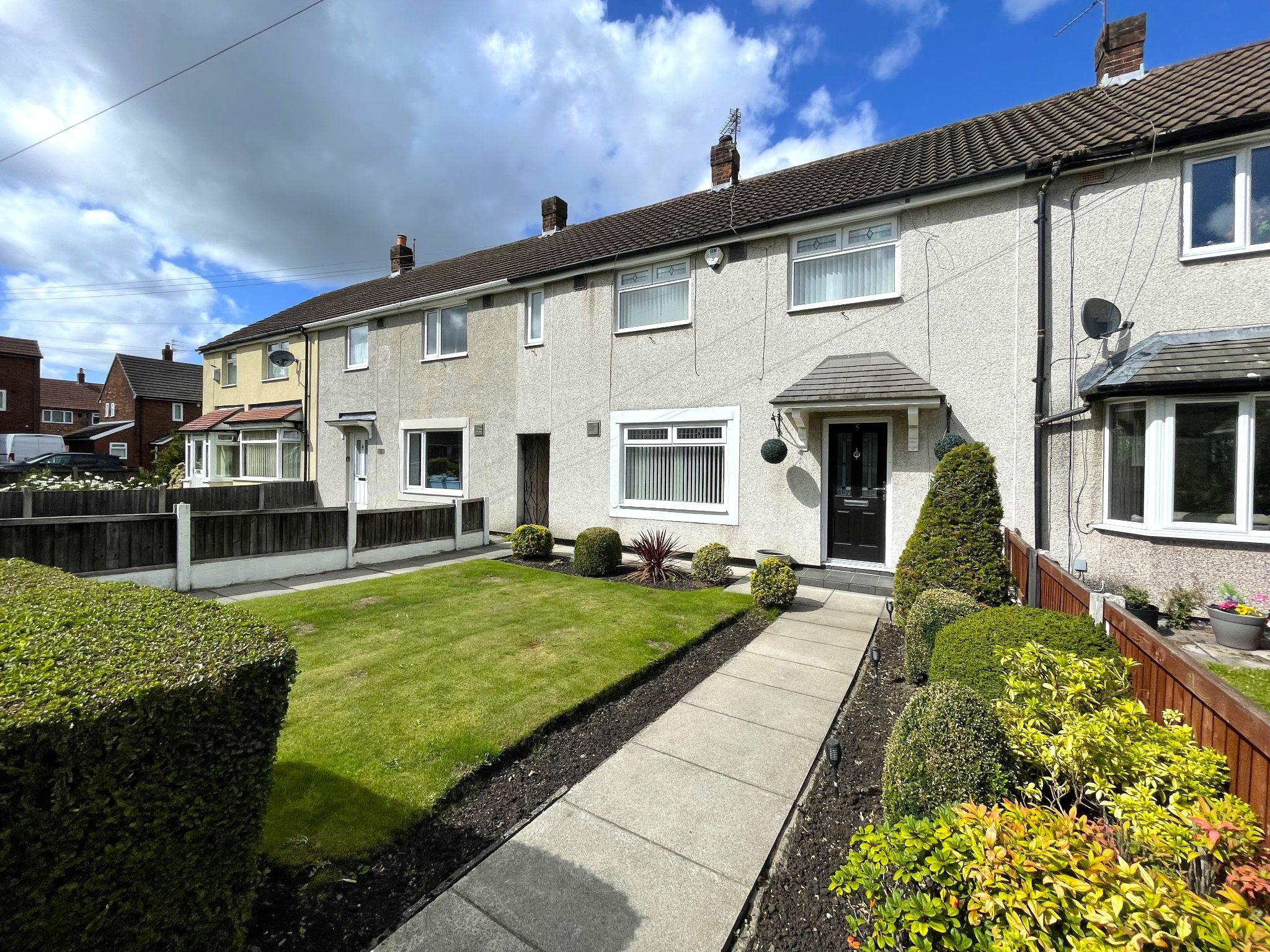 4 bedroom mid terraced house For Sale in Manchester - Photograph 1.