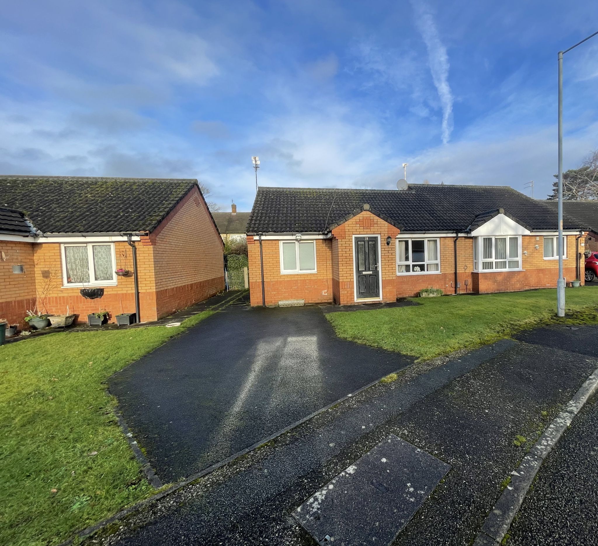 2 bedroom semi-detached bungalow SSTC in Manchester - Photograph 1.
