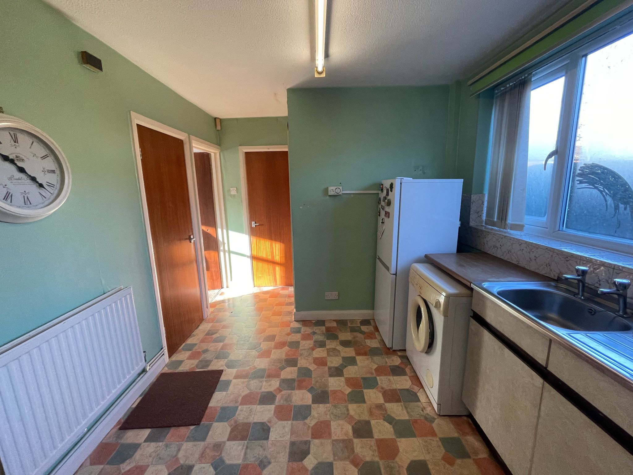 3 bedroom mid terraced house SSTC in Manchester - Photograph 4.