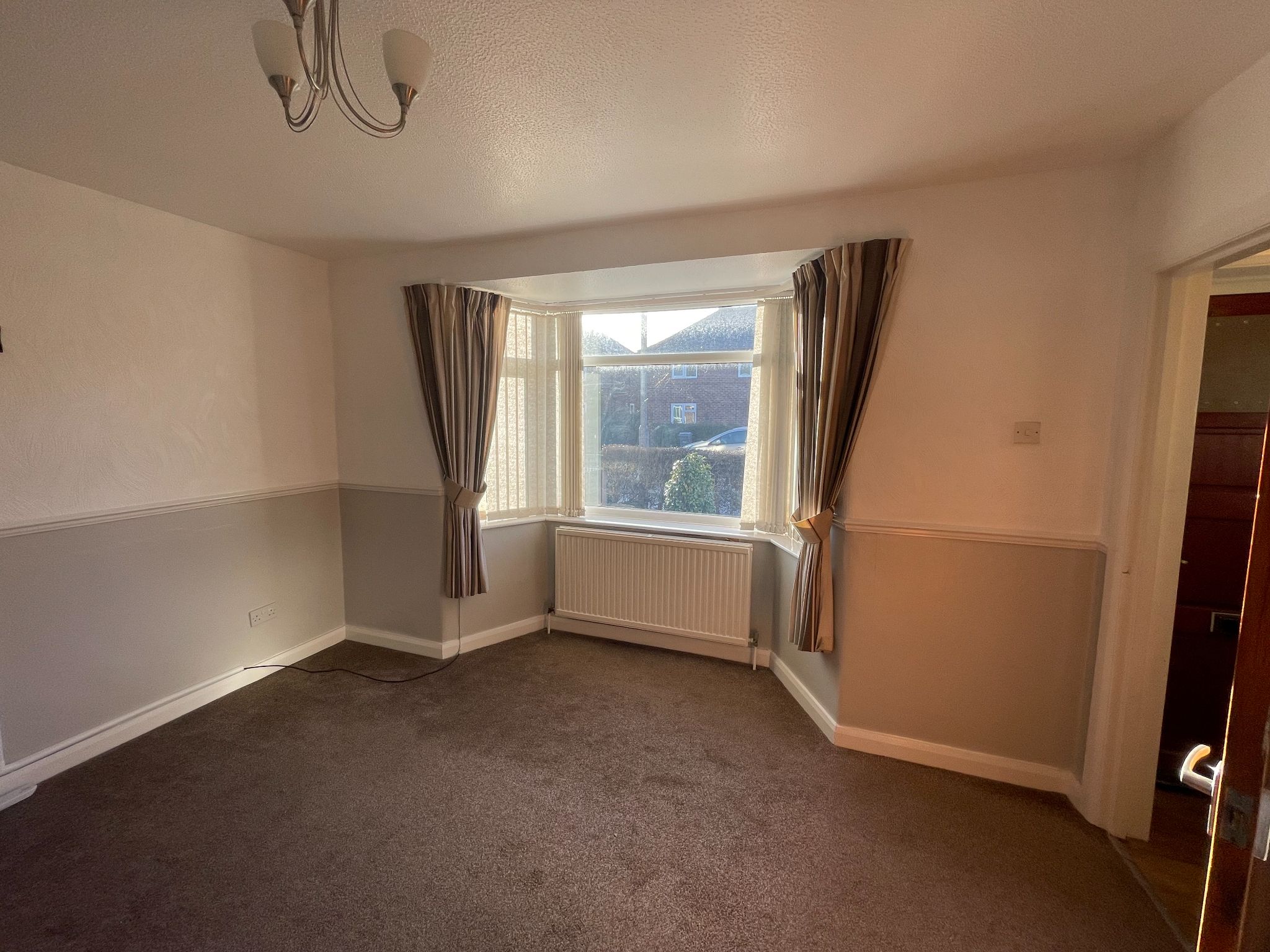 3 bedroom mid terraced house SSTC in Manchester - Photograph 3.