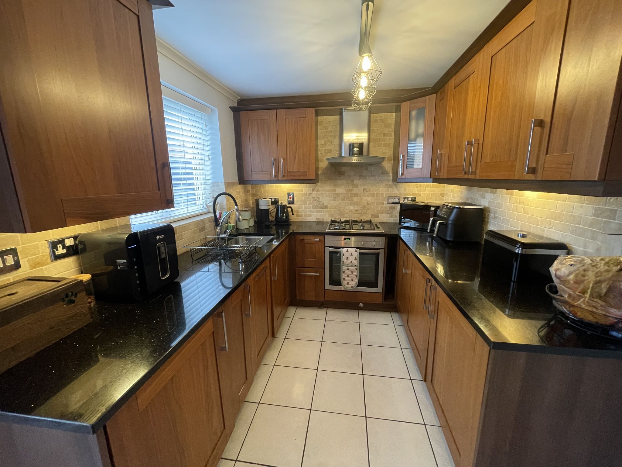 3 bedroom mid terraced house SSTC in Manchester - Photograph 7.