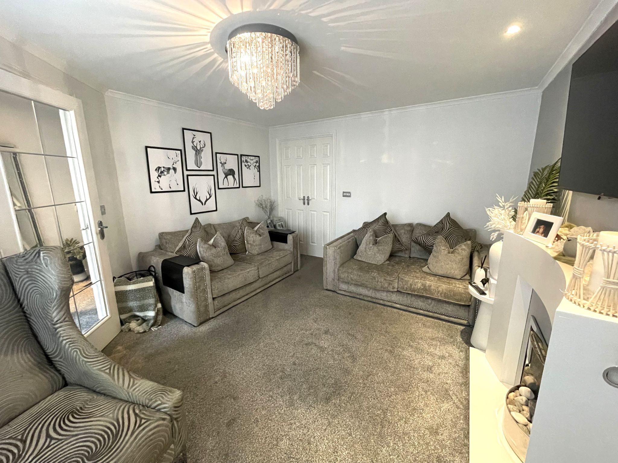 3 bedroom mid terraced house SSTC in Manchester - Photograph 3.