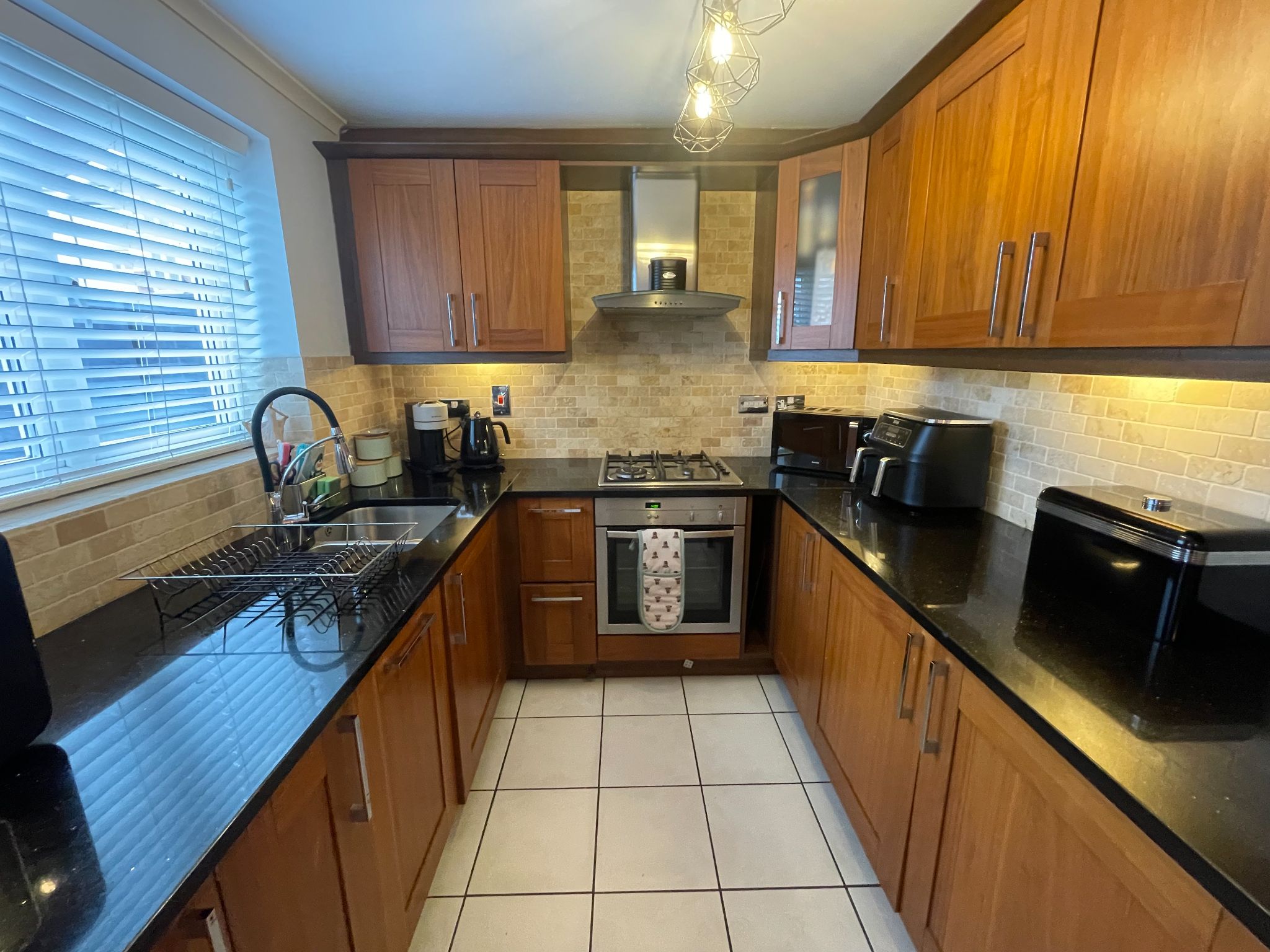 3 bedroom mid terraced house SSTC in Manchester - Photograph 6.