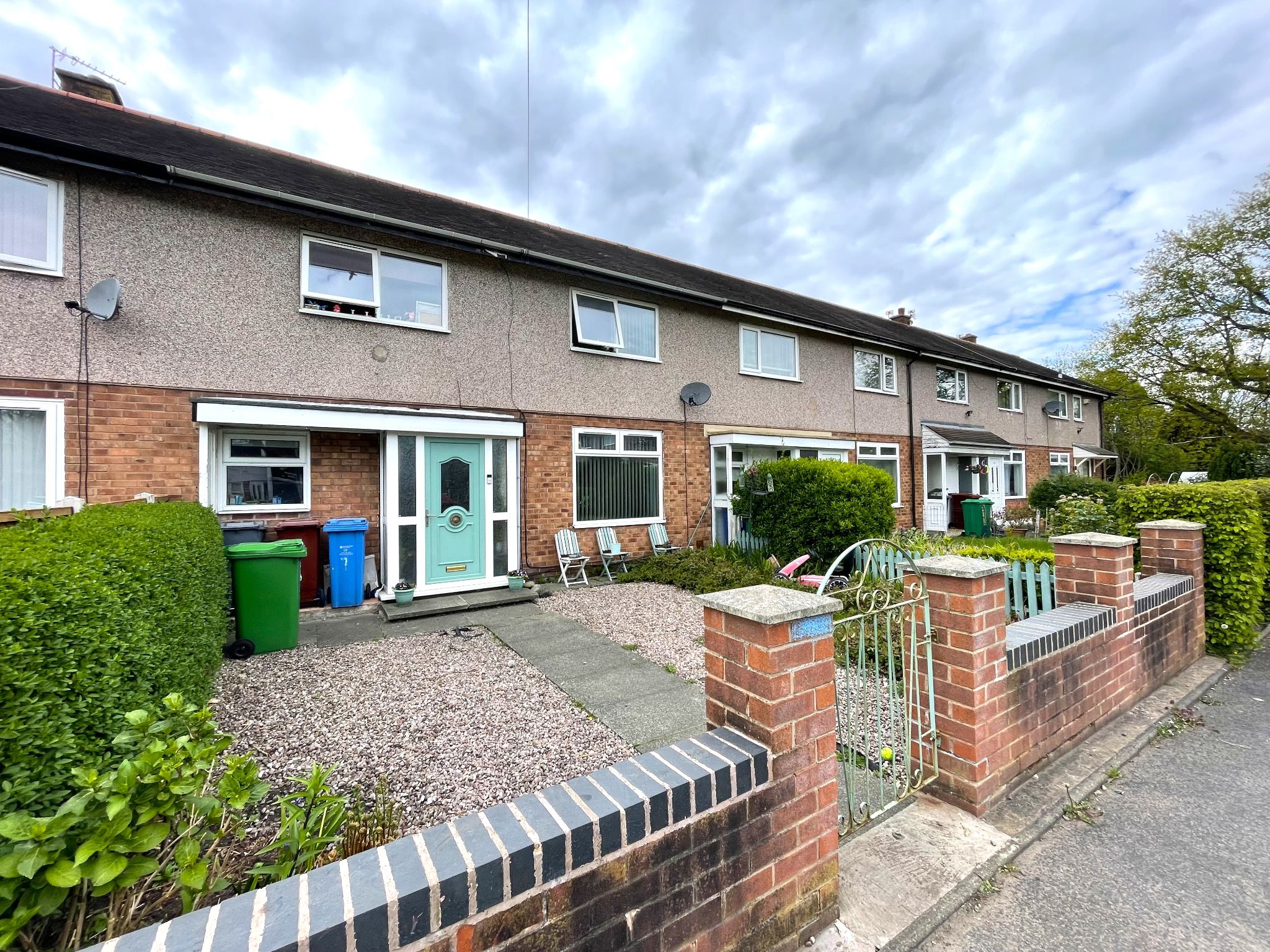 3 bedroom mid terraced house For Sale in Manchester - Photograph 1.