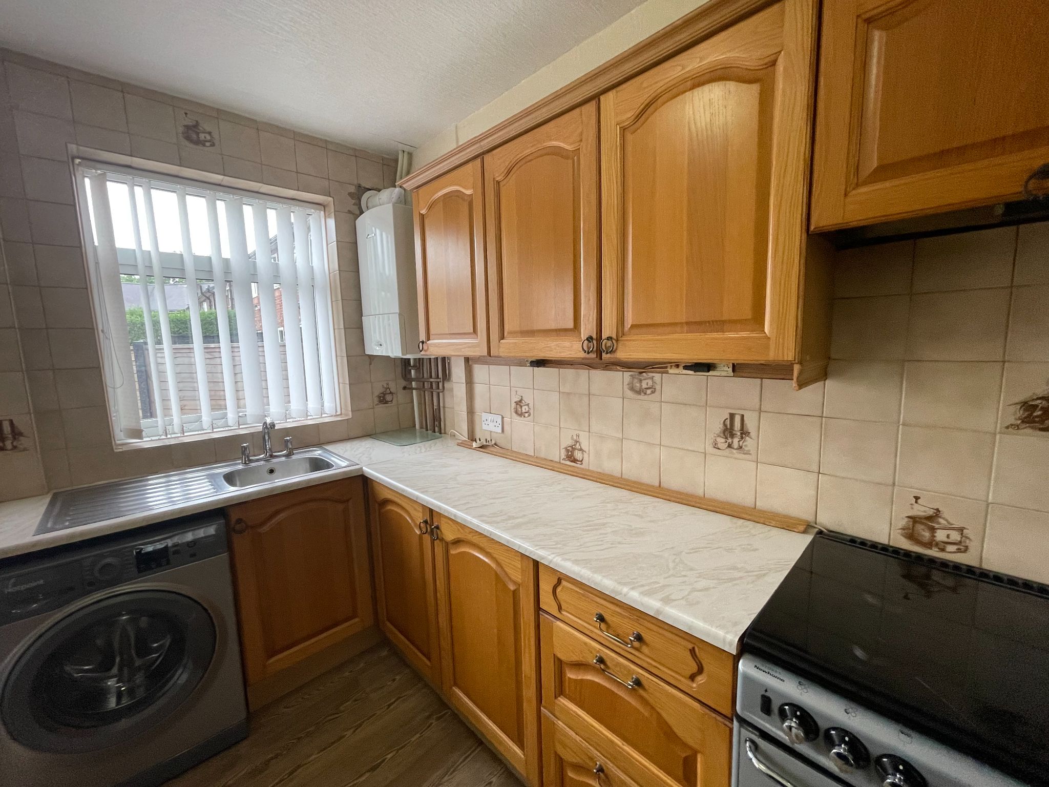 3 bedroom mid terraced house For Sale in Manchester - Photograph 9.