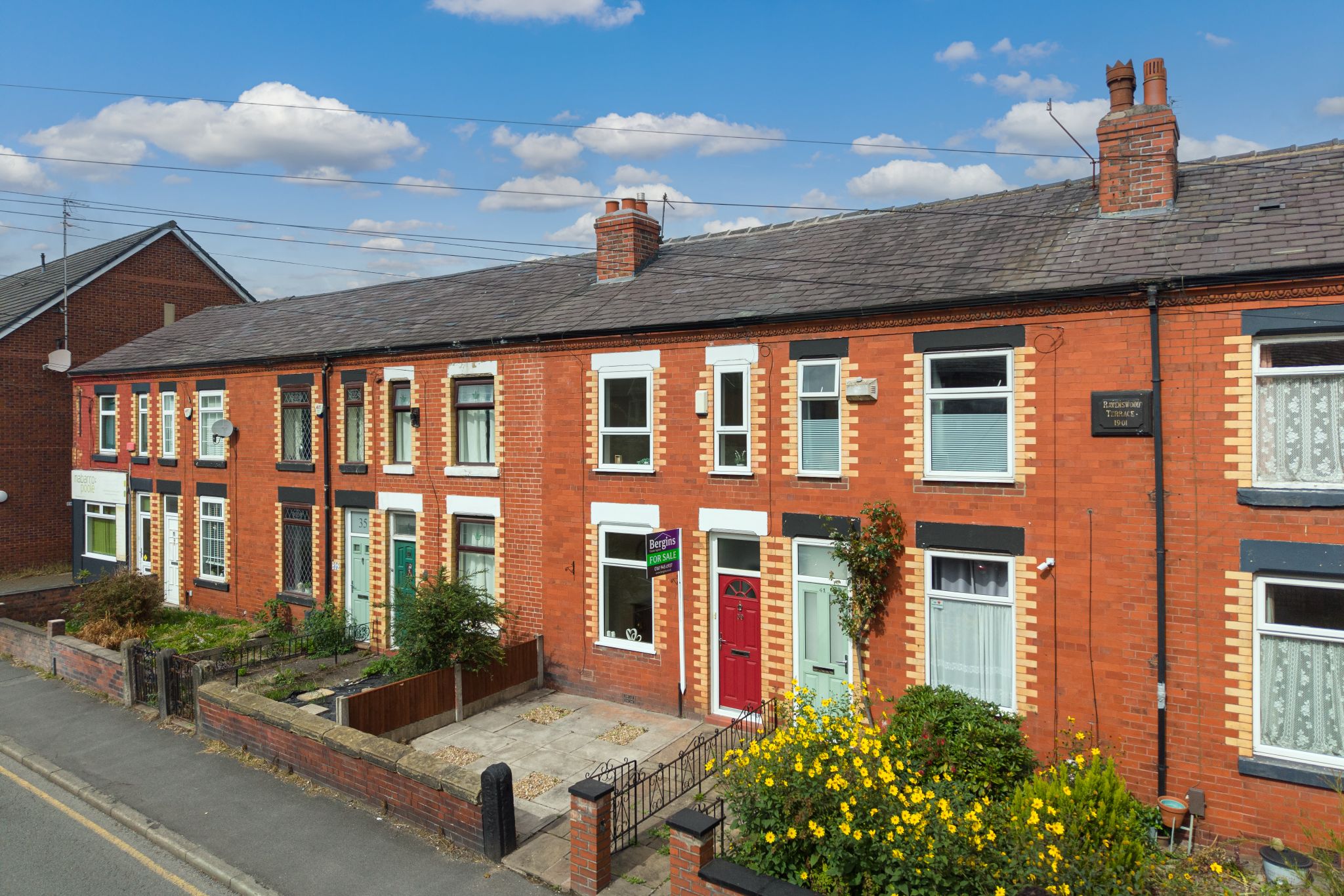 2 bedroom mid terraced house For Sale in Manchester - Photograph 1.