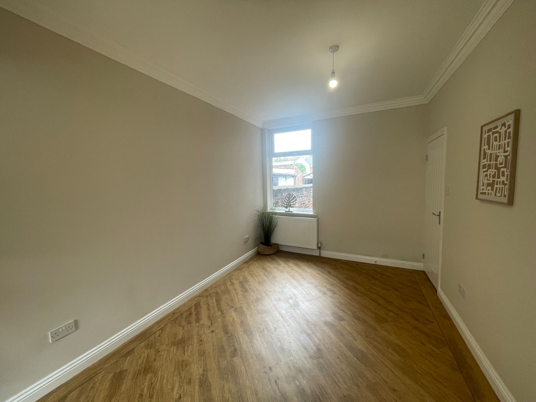 2 bedroom mid terraced house For Sale in Manchester - Photograph 8.