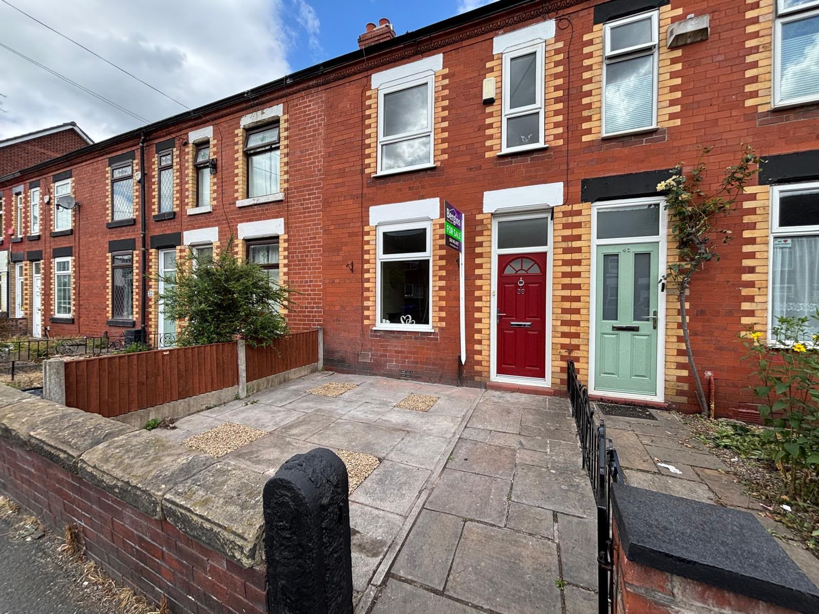 2 bedroom mid terraced house For Sale in Manchester - Property photograph.