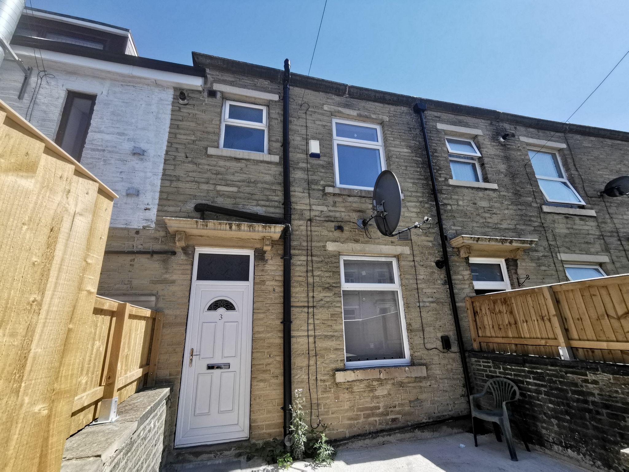2 bedroom mid terraced house To Let in Bradford - Photograph 1.