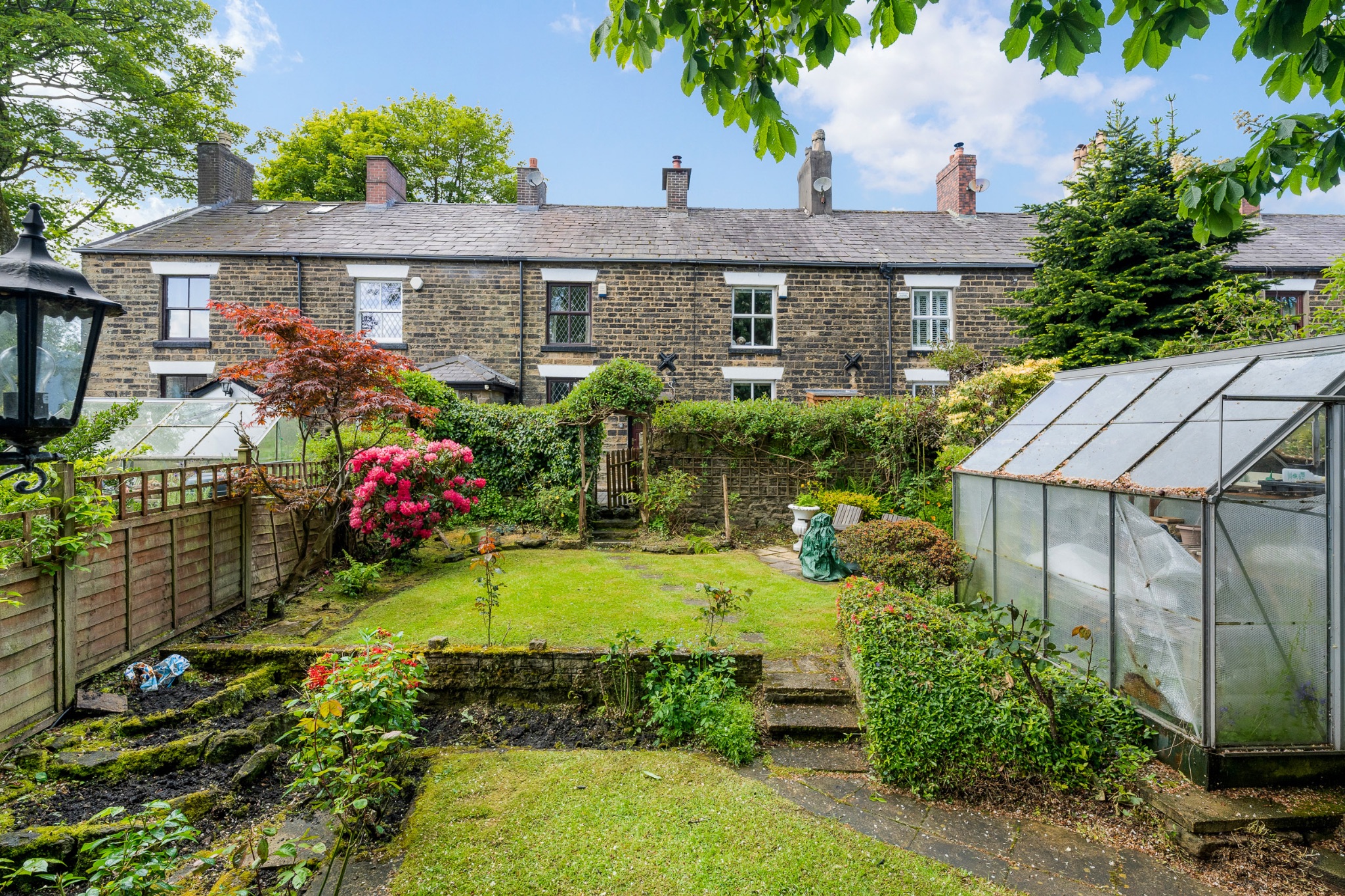 2 bedroom mid terraced house For Sale in Bolton - Photograph 1.