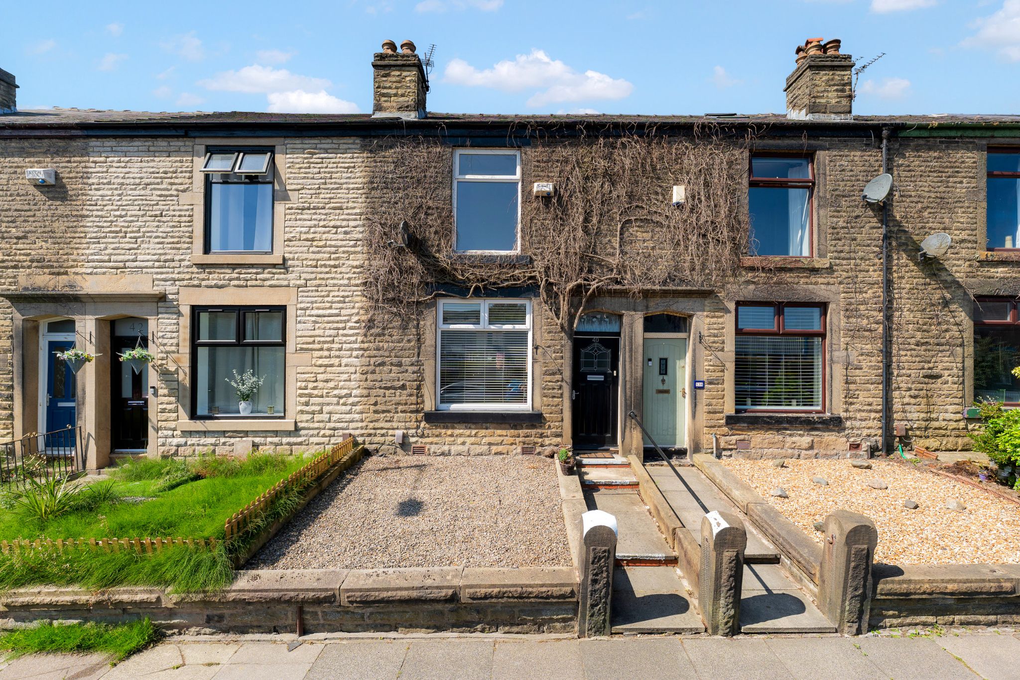 2 bedroom mid terraced house For Sale in Bolton - Photograph 1.