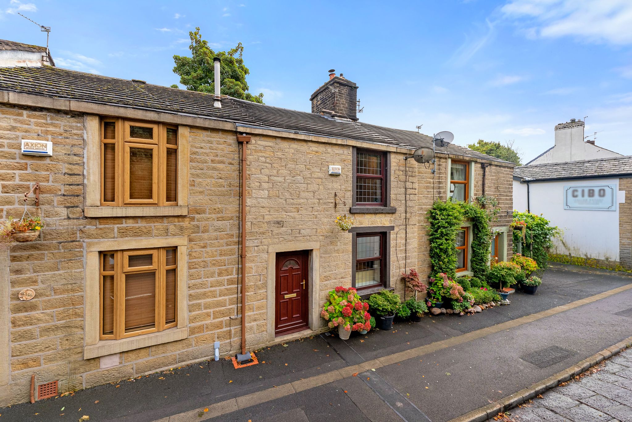 2 bedroom mid terraced house For Sale in Bolton - Photograph 1.