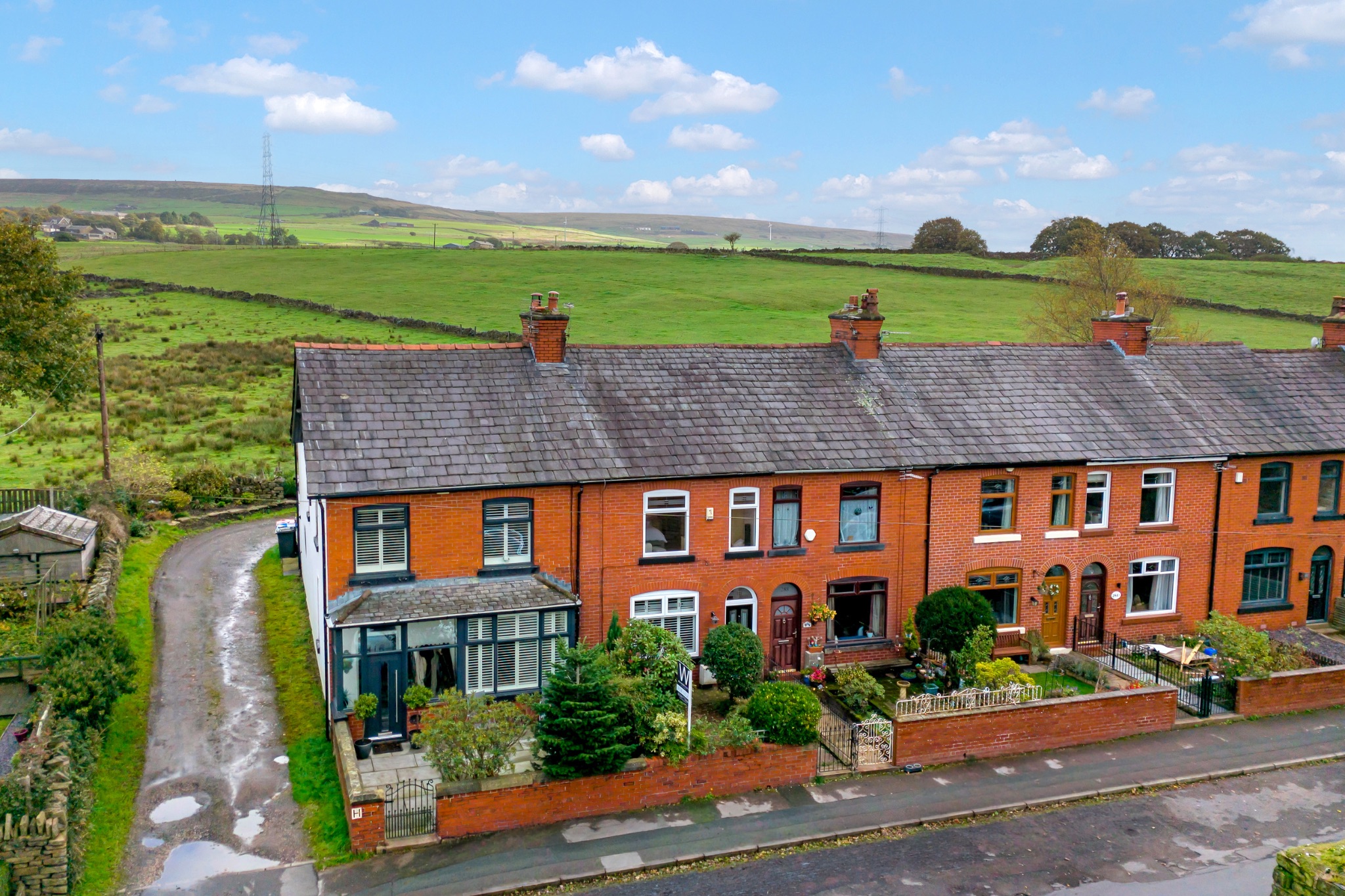 3 bedroom mid terraced house For Sale in Turton - Photograph 1.