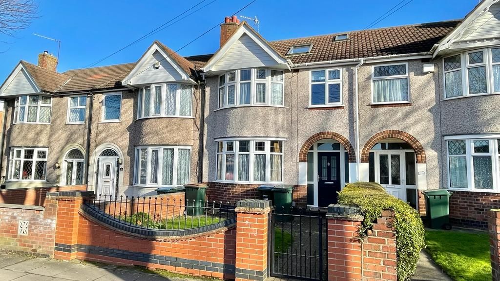 4 bedroom mid terraced house Sold in Coventry - Photograph 1.